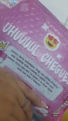 Cliente com produto Happy Hair